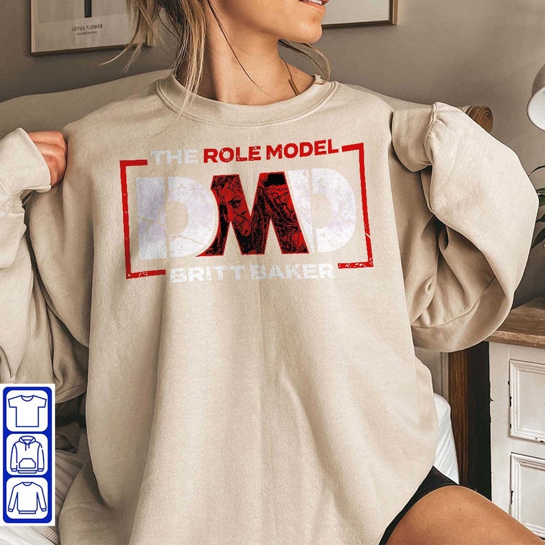 The Role Model Dmd Britt Baker T-Shirt, Britt Baker Battle Damage Sweatshirt, Hoodie, Sweater, Long Sleeve And Tank Top