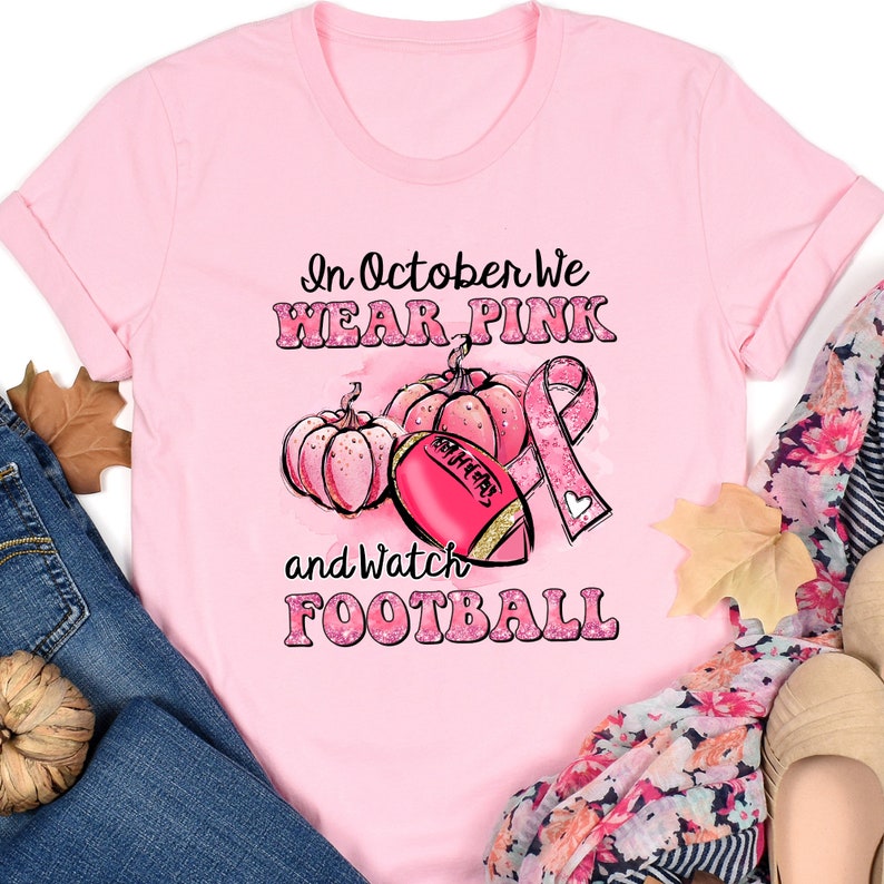 Breast Cancer Shirt, Breast Cancer Football Shirt, Halloween Pumpkin Shirt, In October We Wear Pink And Watch Football, Pumpkin Tee E33Fv