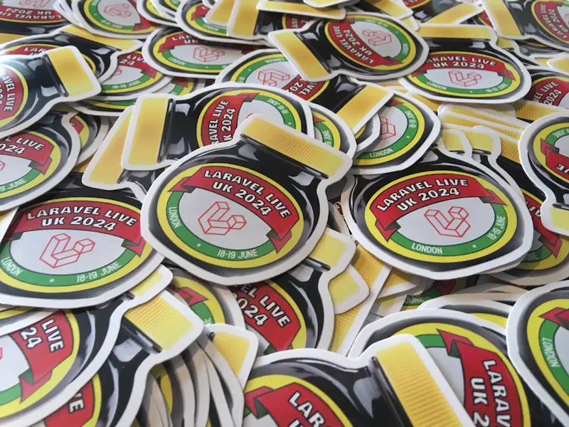 A pile of stickers for the Laravel Live UK 2024 conference