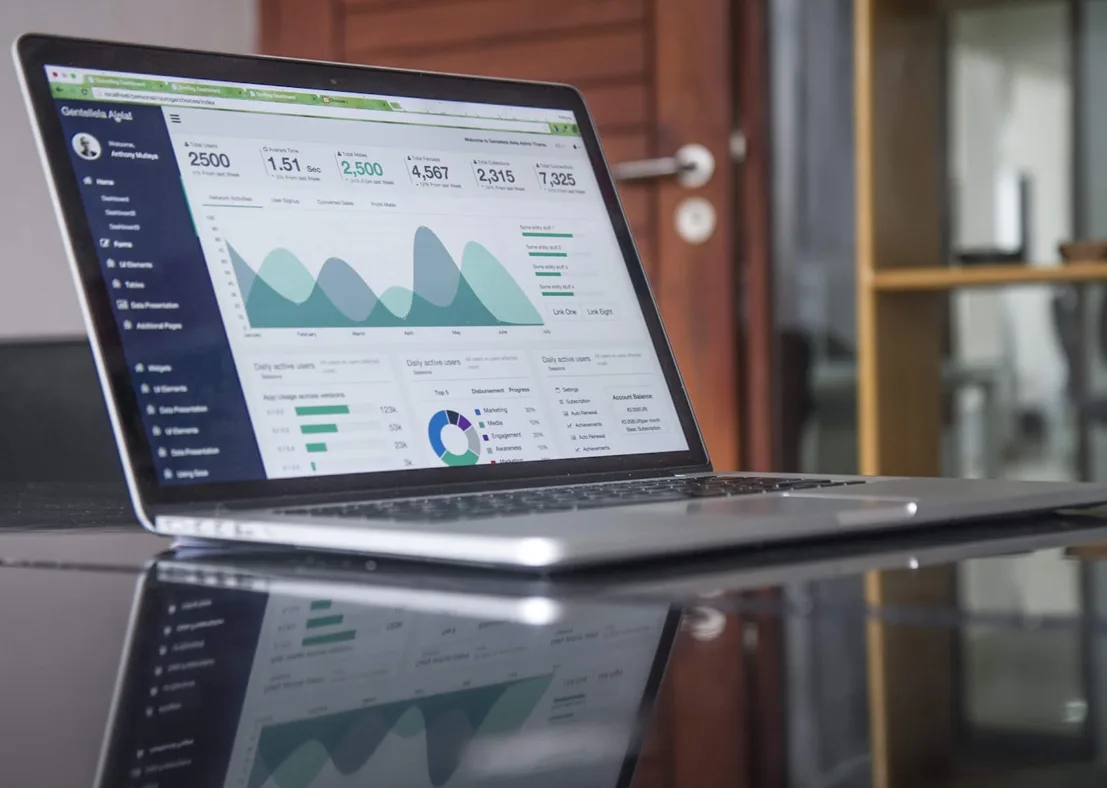 Team reviewing analytics reports and business charts