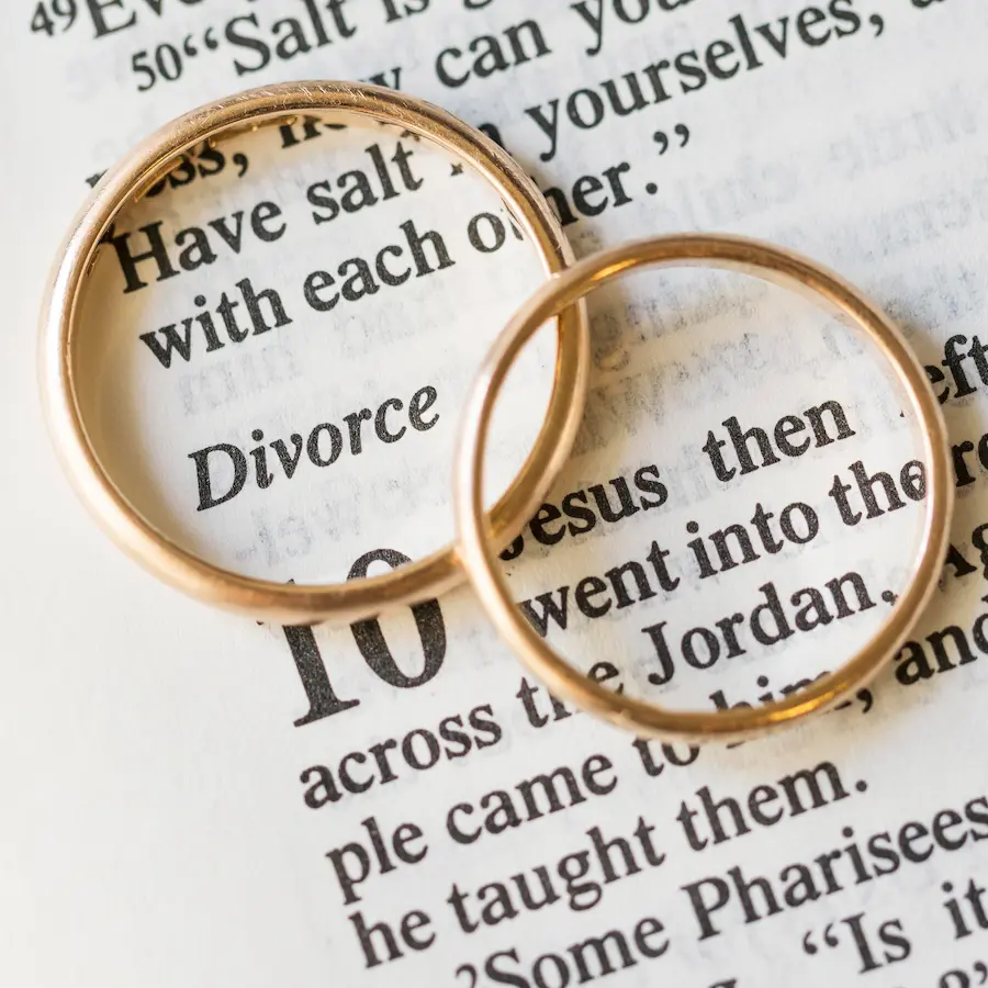 Flat lay of golden wedding rings