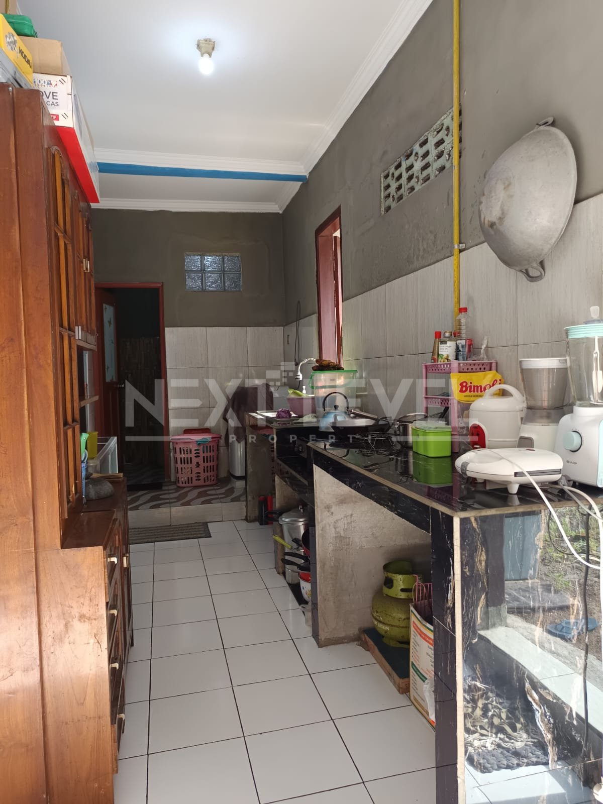 Jual tanah dan bangunan di jelidro 