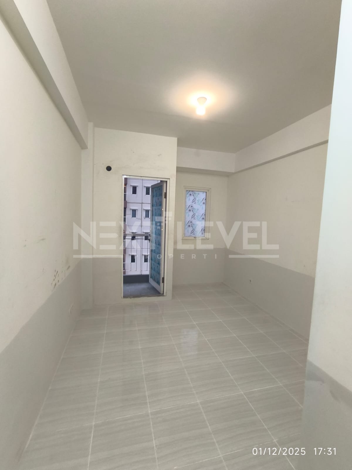 Disewakan Apartemen Puncak Dharmahusada MERR Surabaya