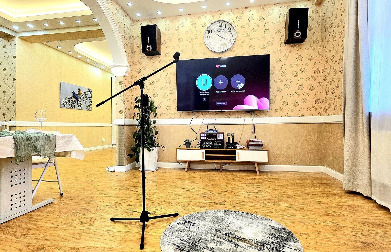 Karaoke system with microphones and TV