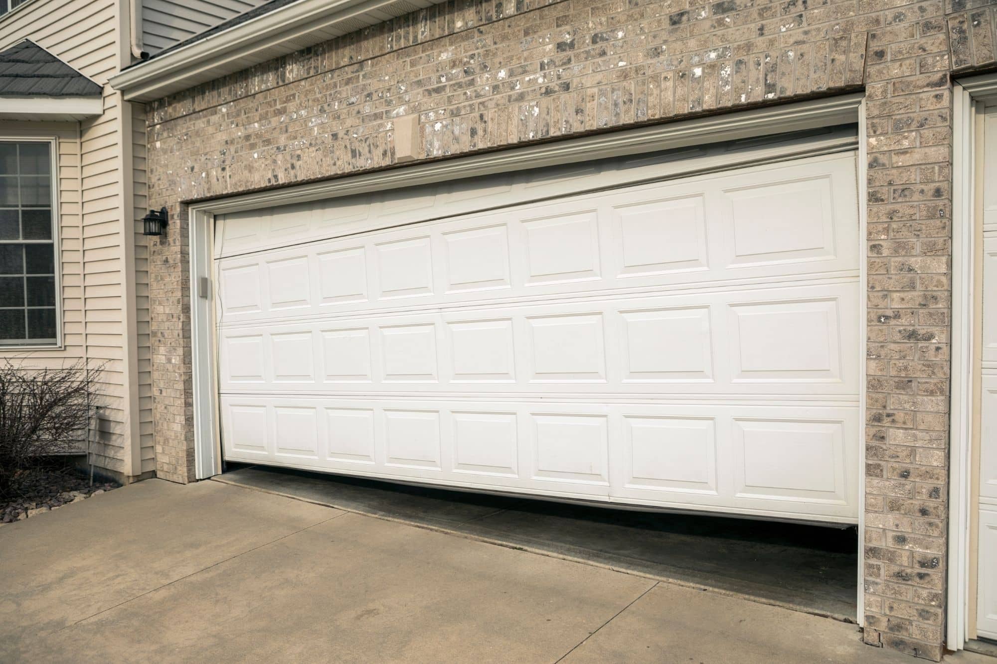 How to Fix a Crooked Garage Door
