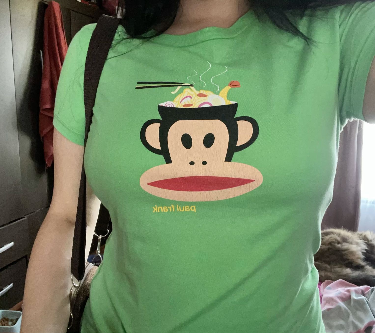 green Baby Tee features a graphic of &hellip;