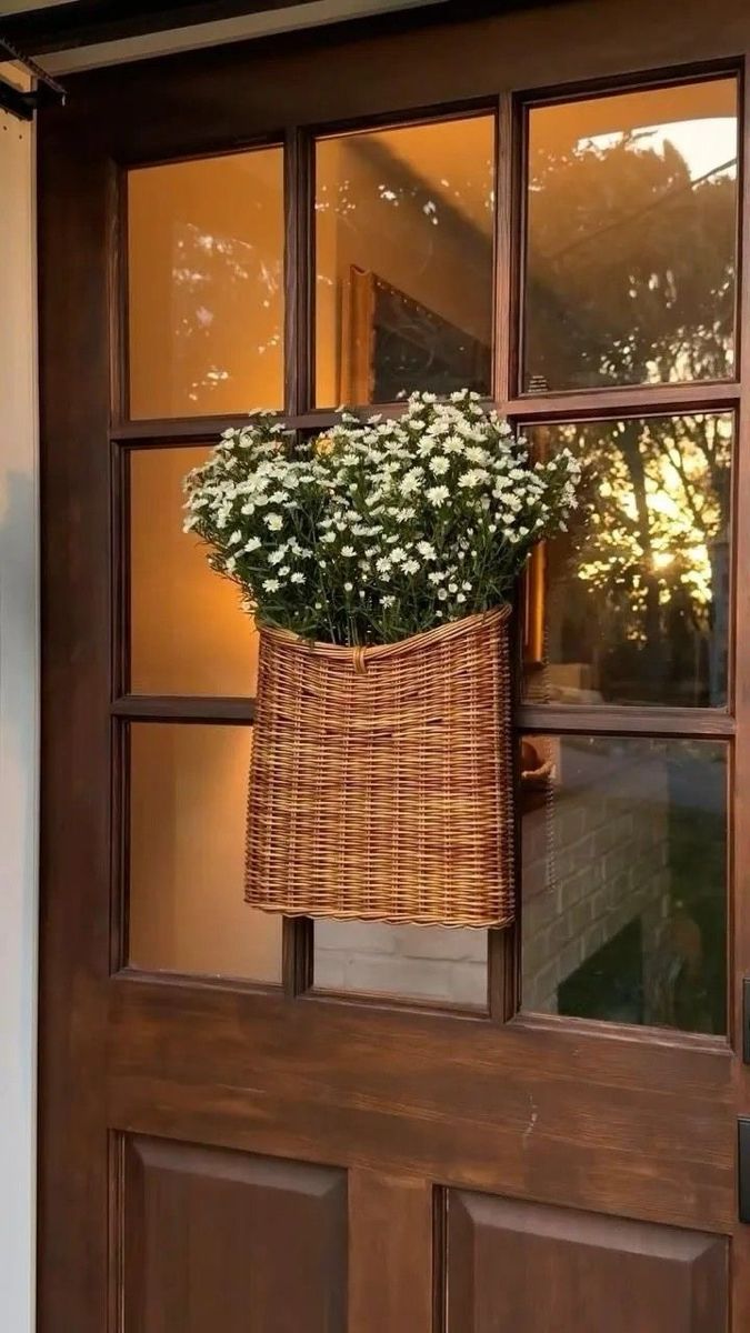 a rustic wicker basket filled with small white flowers