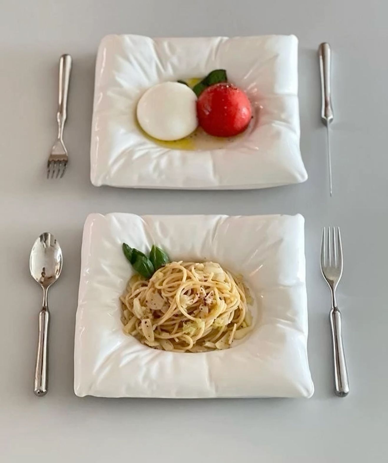 White Dinnerware Set with Silver Flatware
