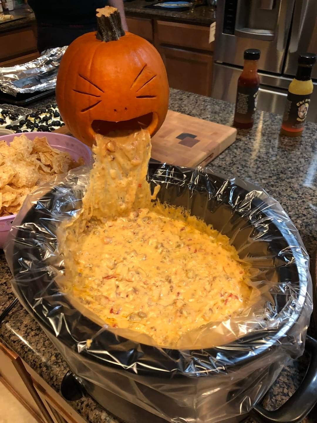 Halloween Party Dip, Halloween Party Food Ideas, How To Make Halloween Dips, Pumpkin Face Dip Bowl, Spooky Appetizer Idea