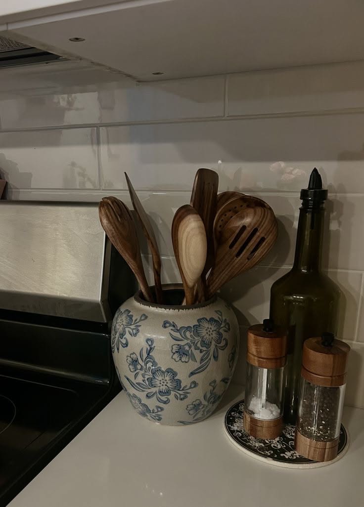 Kitchen Utensils in a Blue and White Countertop Vase
