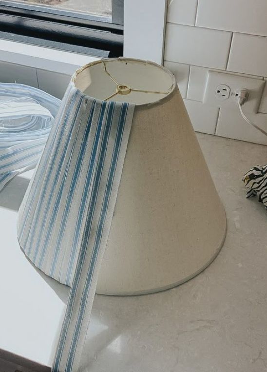 Lampshade Diy Makeover, Diy Lampshade Cover, Coastal Lampshades Diy, Diy Fabric Lampshade Cover, Diy Fabric Lampshade Project, Vintage Striped Lamp, Ticking Stripe Lampshade, Striped Lampshade Design Ideas, Pleated Lampshade Tutorial