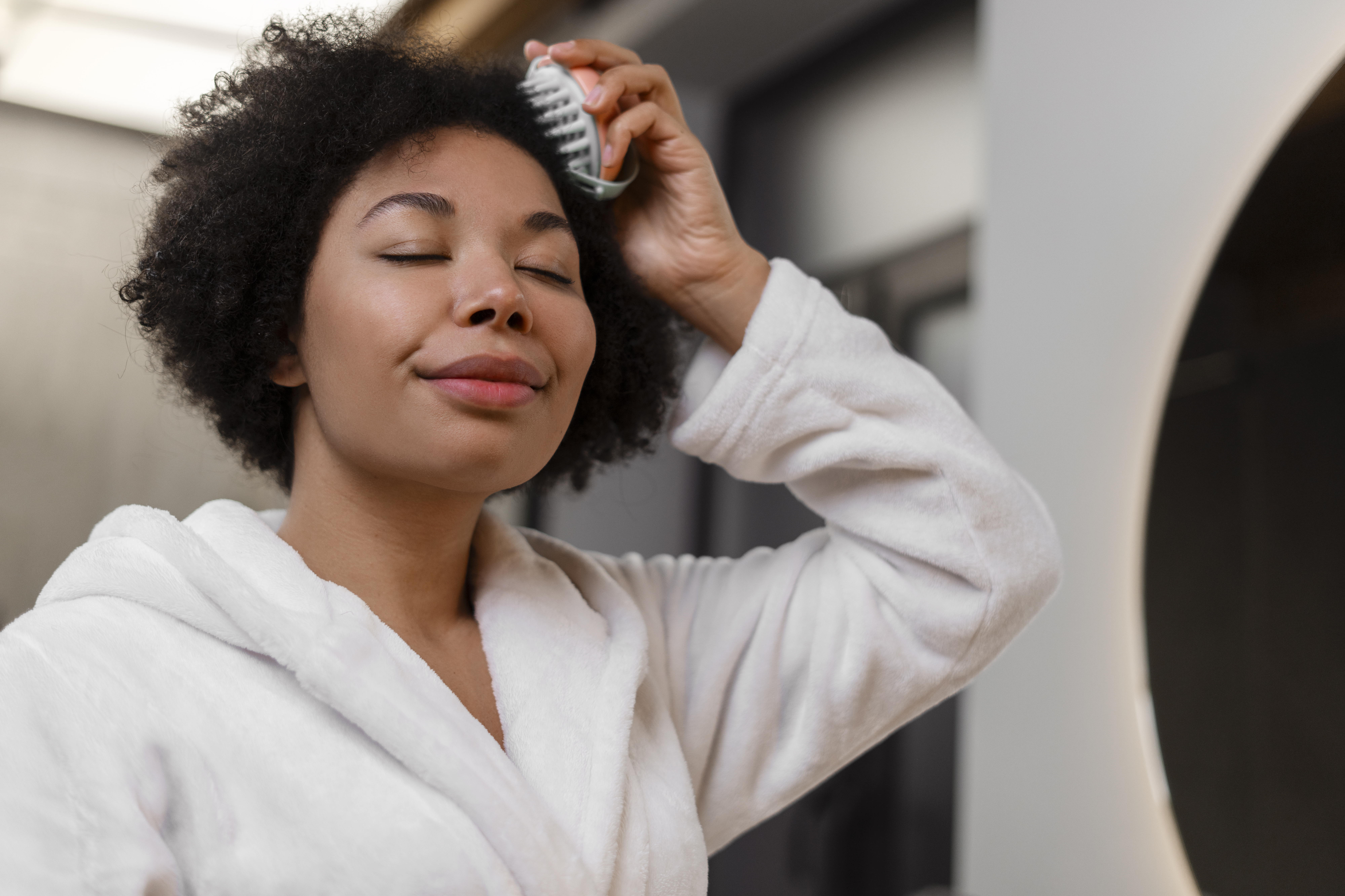 Four minutes of scalp massage per wash day increases follicle circulation