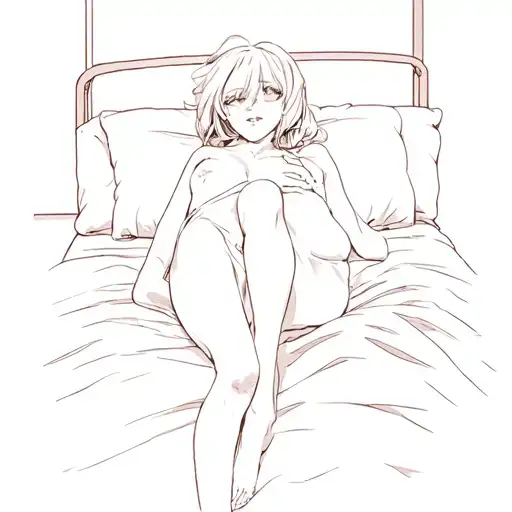 A Woman Laying On A Bed
