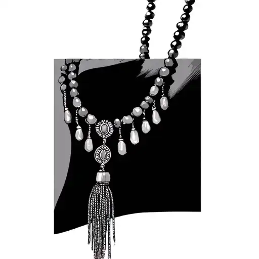 A 33 Beaded Necklace With An Elongated End That Has A Tassle Connected To It On A Arm