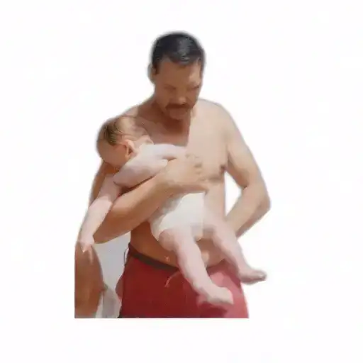A Man Holding A Baby Daughter