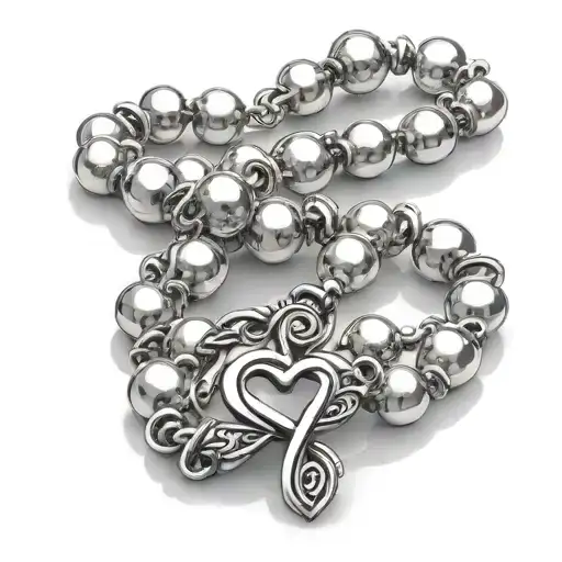 Rosary Of Fine Pearls On The Wrist With Infinity Heart Sign Clasp