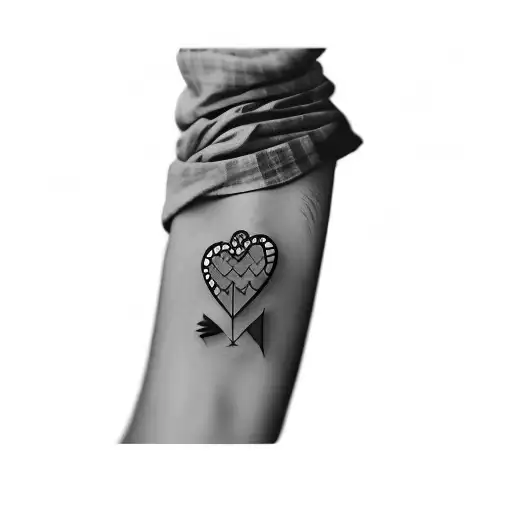 A Tattoo Of A Heart And An Arrow