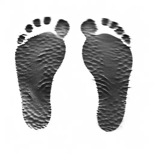 A Pair Of Footprints On A Black Background