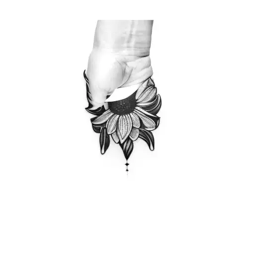 A Black And White Tattoo Of A Flower