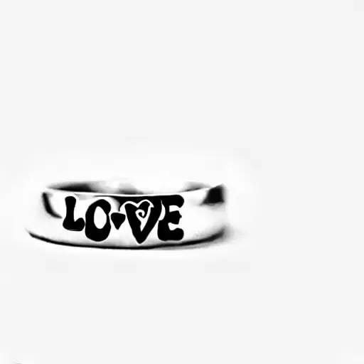A Ring With The Word 'Love' Written On It