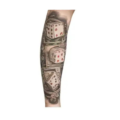 A Sleeve Tattoo Of Dice And Cards