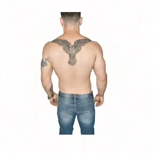 The Back Of A Man With A Tattoo Of An Eagle