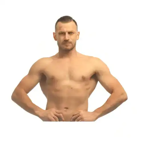 A Man Posing In Front Of A Black Background