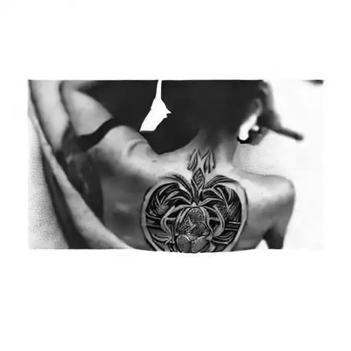 A Tattoo On Male Lower Back