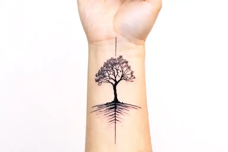Tree Life In The Forearm With Two Lines Coming From The Wrist