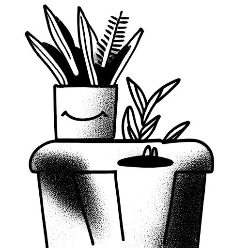 Cat Sitting In A Plant Pot