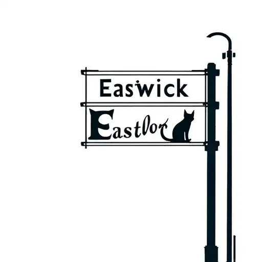 A Street Sign That Says Eastwick With A Cat