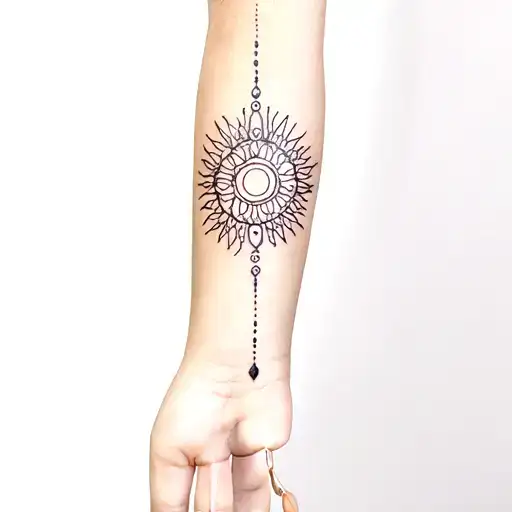 Elbow Tattoo With Sun And Dainty Pattern Mandala Incorporating Elements