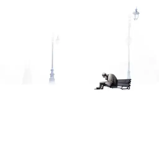 A Man Sitting On A Bench In The Dark