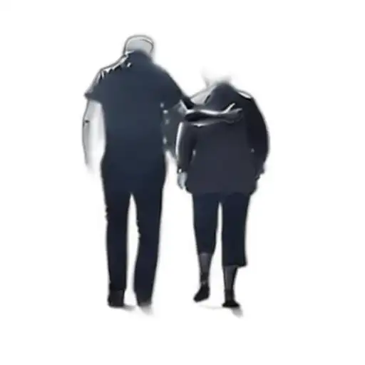 Two People Walking In The Dark
